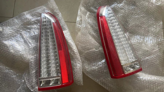2006-2011 CADILLAC DTS ECE EXPORT CLEAR TAILLIGHTS PAIR SET OEM GM