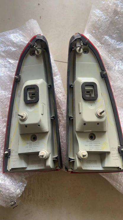 2006-2011 CADILLAC DTS ECE EXPORT CLEAR TAILLIGHTS PAIR SET OEM GM