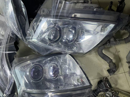 2005-11 STS EURO HEADLIGHT LEFT OR RIGHT SIDE USED