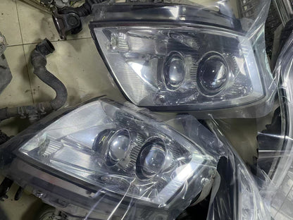 2005-11 STS EURO HEADLIGHT LEFT OR RIGHT SIDE USED