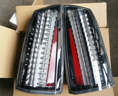 2005-11 CADILLAC STS EURO CLEAR TAILLIGHTS PAIR SET NEW OEM GM
