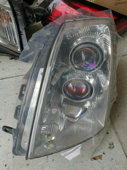 2005-11 STS EURO HEADLIGHT LEFT OR RIGHT SIDE USED