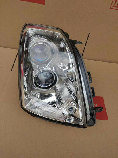 2005-11 STS EURO HEADLIGHT LEFT OR RIGHT SIDE USED