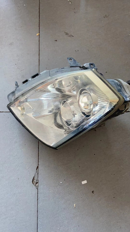 2005-11 STS EURO HEADLIGHT LEFT OR RIGHT SIDE USED